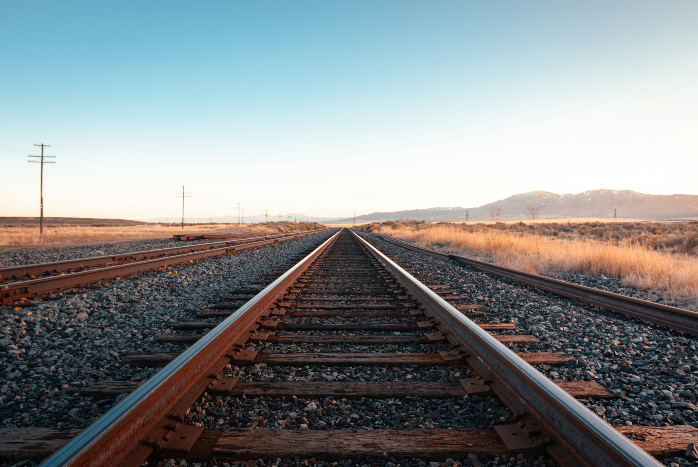 Shipping containers on freight rail cars