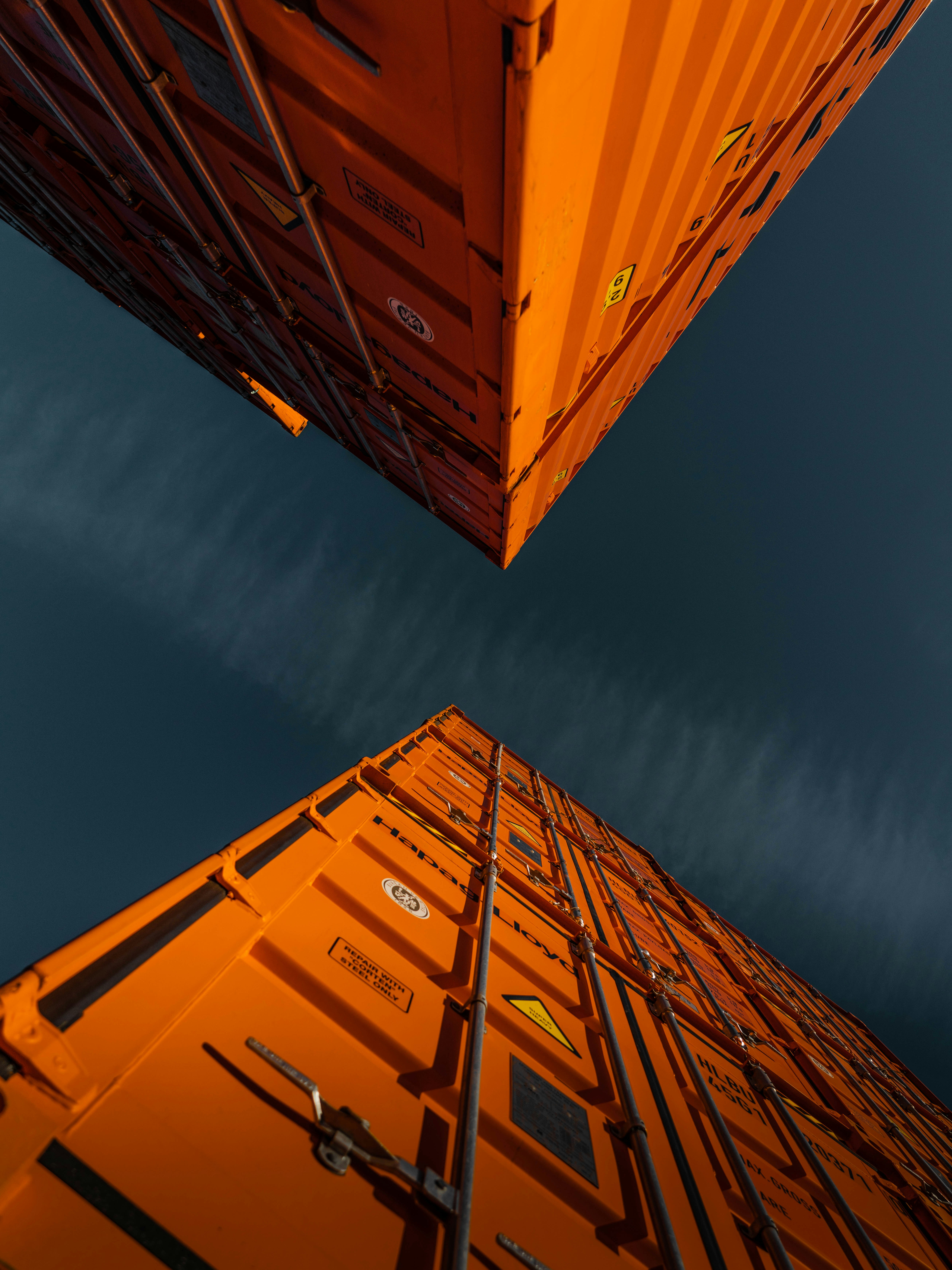 Forklift loading cargo into a shipping container